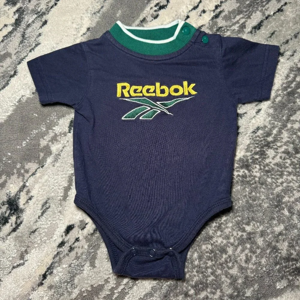 Retro Reebok 6-9 Month Embroidered Blue, Green, and Yellow Short Sleeve Onesie